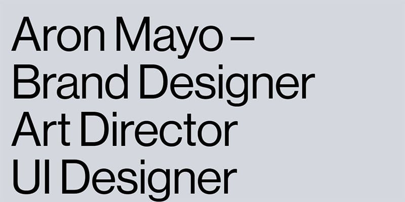 1. Aron Mayo - Gray Websites with Neutral Color Schemes Example